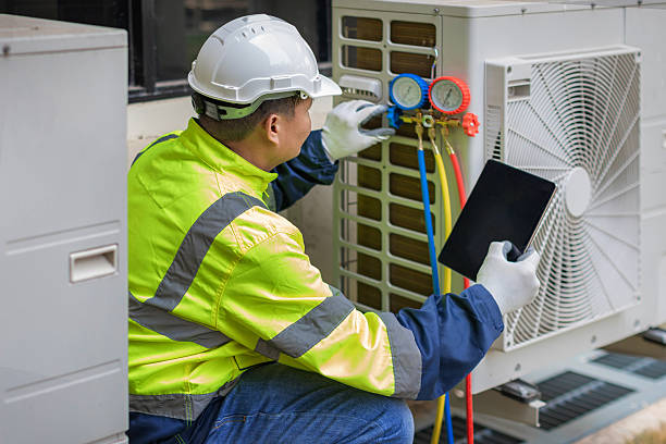 Professional Hvac technician working in Wyoming, OH